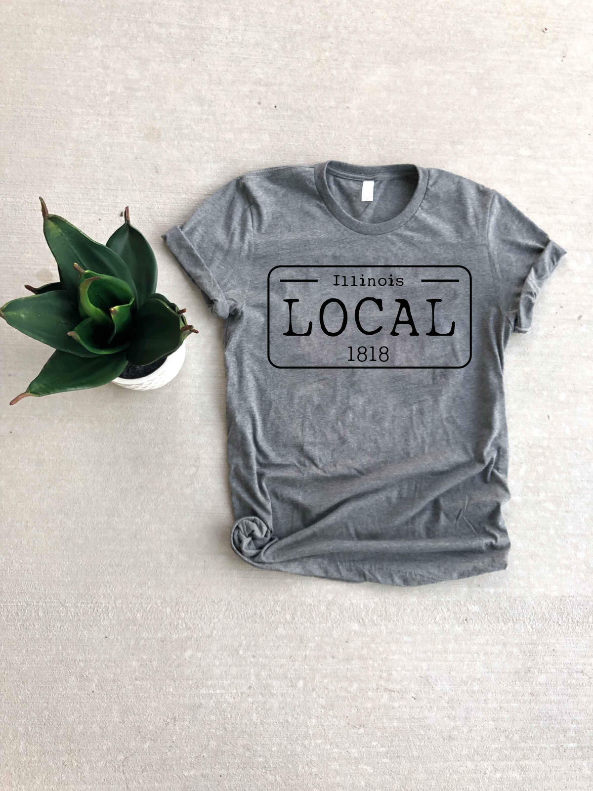 Local license plate state tee- D-I Short sleeve state tee Bella Canvas 3001 natural and deep heather XS Heather Grey Delaware